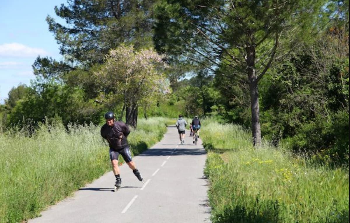 A skater on the Voie Verte, a traffic-free path through open country